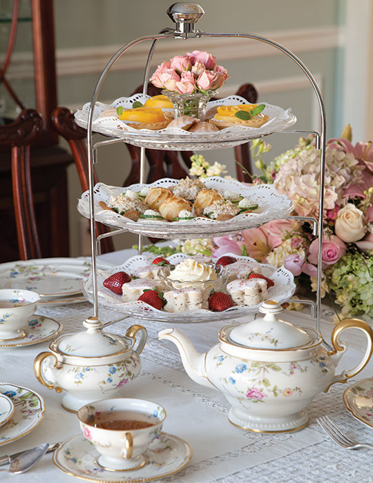 formal tea setting with china and flowers
