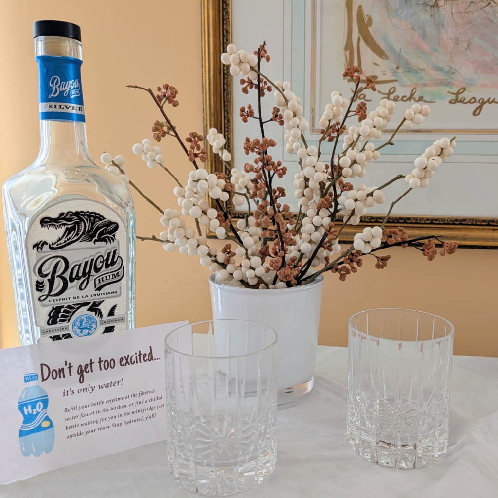 filtered water bottle and glasses with a quirky message